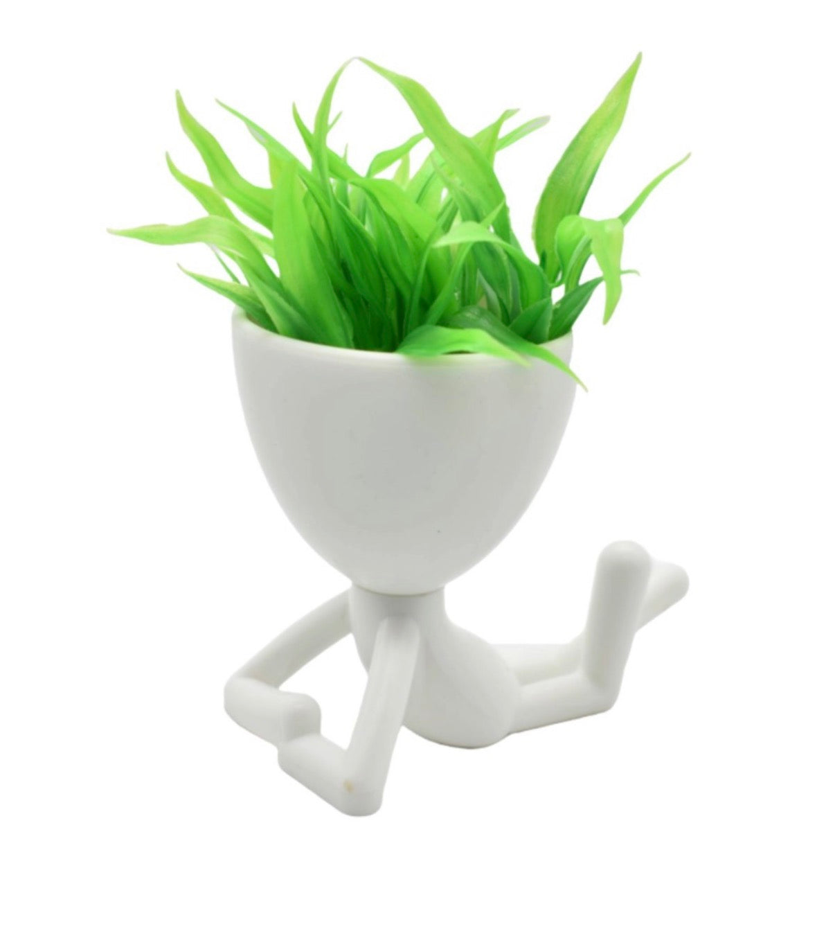 Maceta decorativa con planta artificial