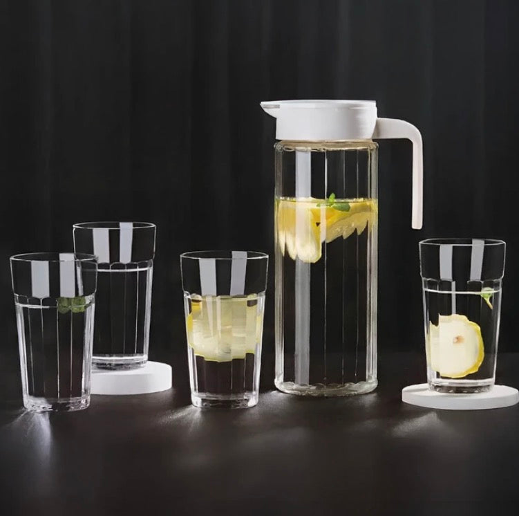Set jarra más 4 vasos. Vidrio resistente